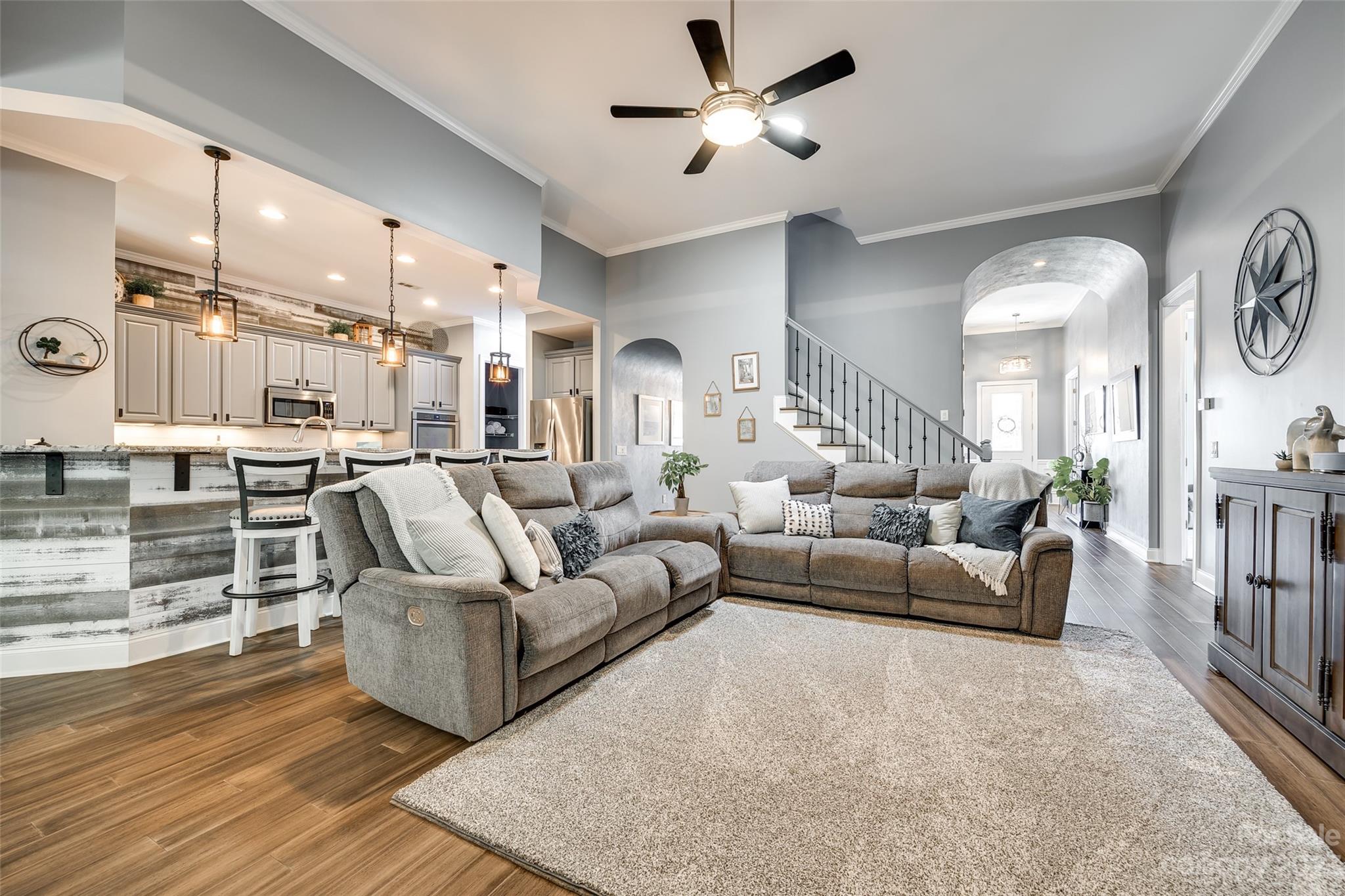 675 Quicksilver Trail Fort Mill, SC 29708 - Photo 13 of 48 a living room with furniture and a large window