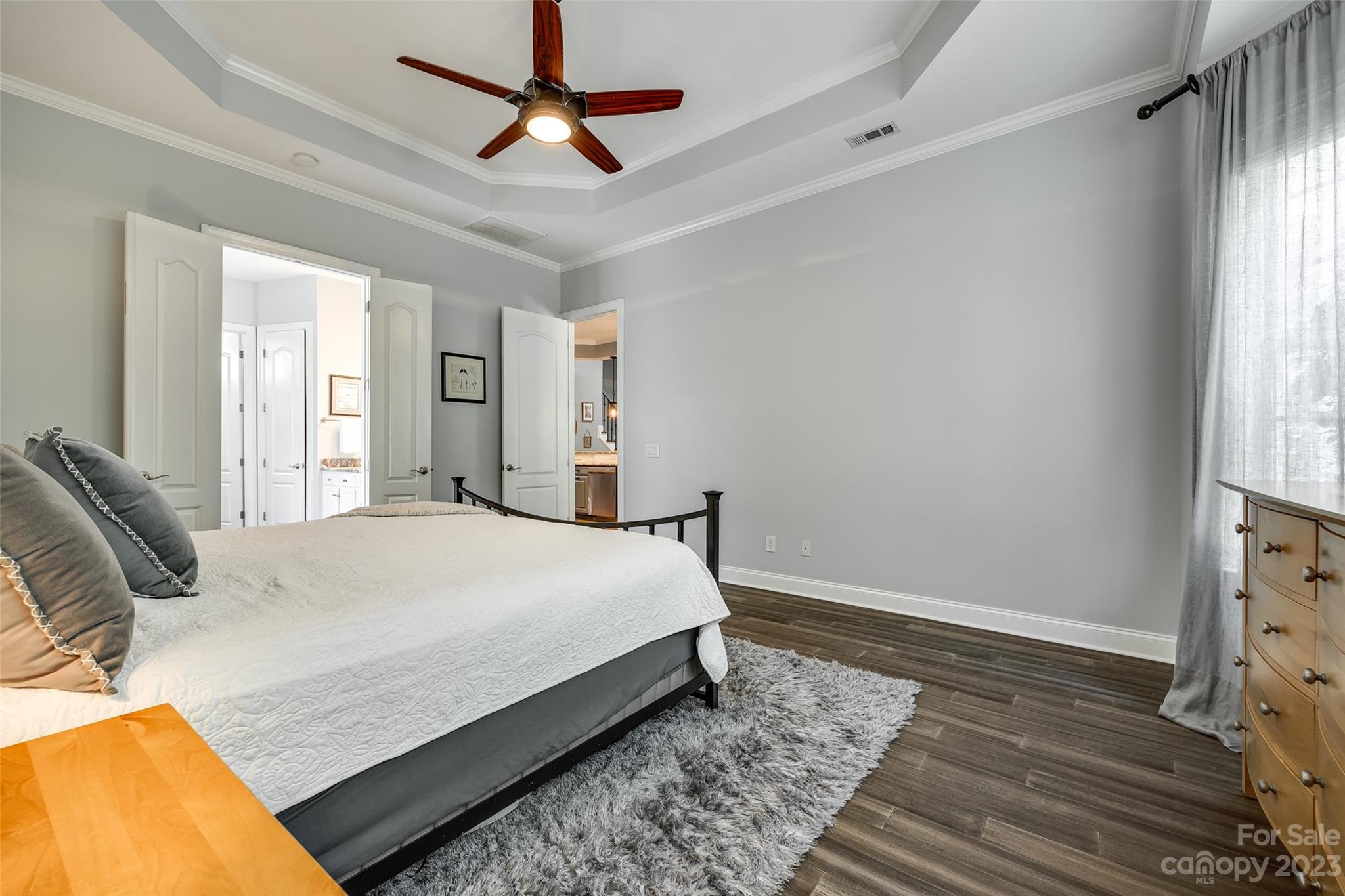 675 Quicksilver Trail Fort Mill, SC 29708 - Photo 21 of 48 a bedroom with a bed dresser and a window