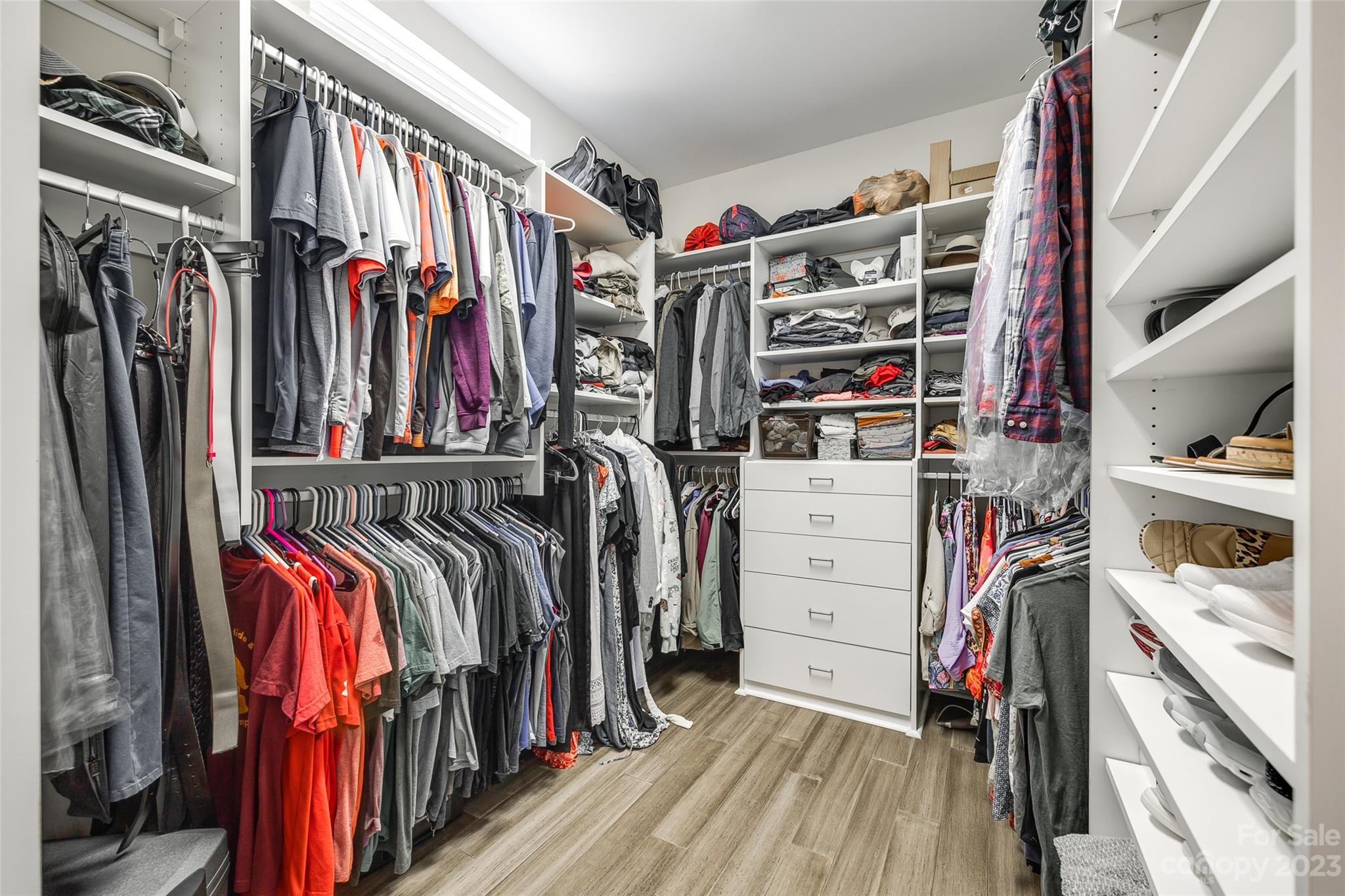 675 Quicksilver Trail Fort Mill, SC 29708 - Photo 24 of 48 a view of walk in closet with clothes