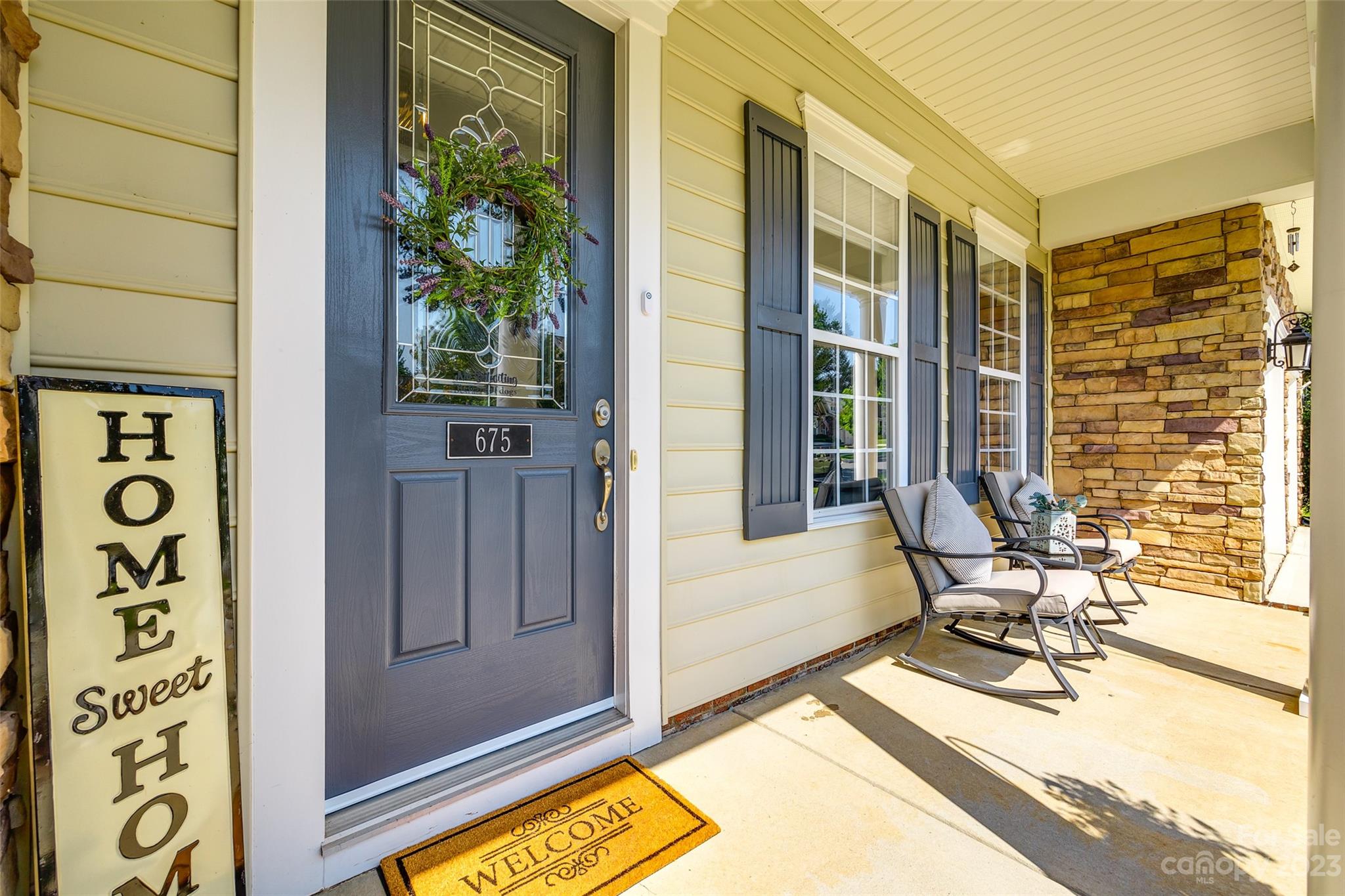 675 Quicksilver Trail Fort Mill, SC 29708 - Photo 3 of 48 a view of a balcony with chair and tables in the balcony
