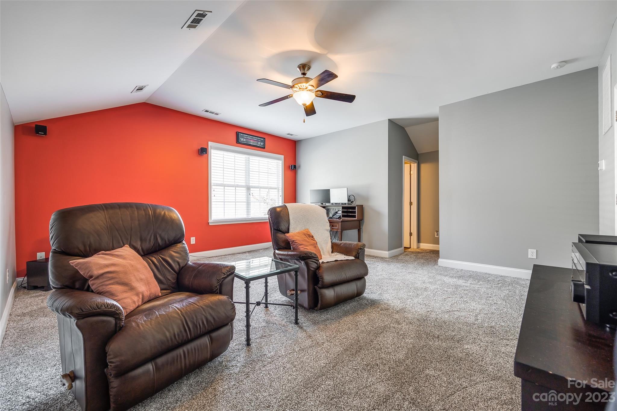 675 Quicksilver Trail Fort Mill, SC 29708 - Photo 32 of 48 a living room with furniture a chandelier fan and a window