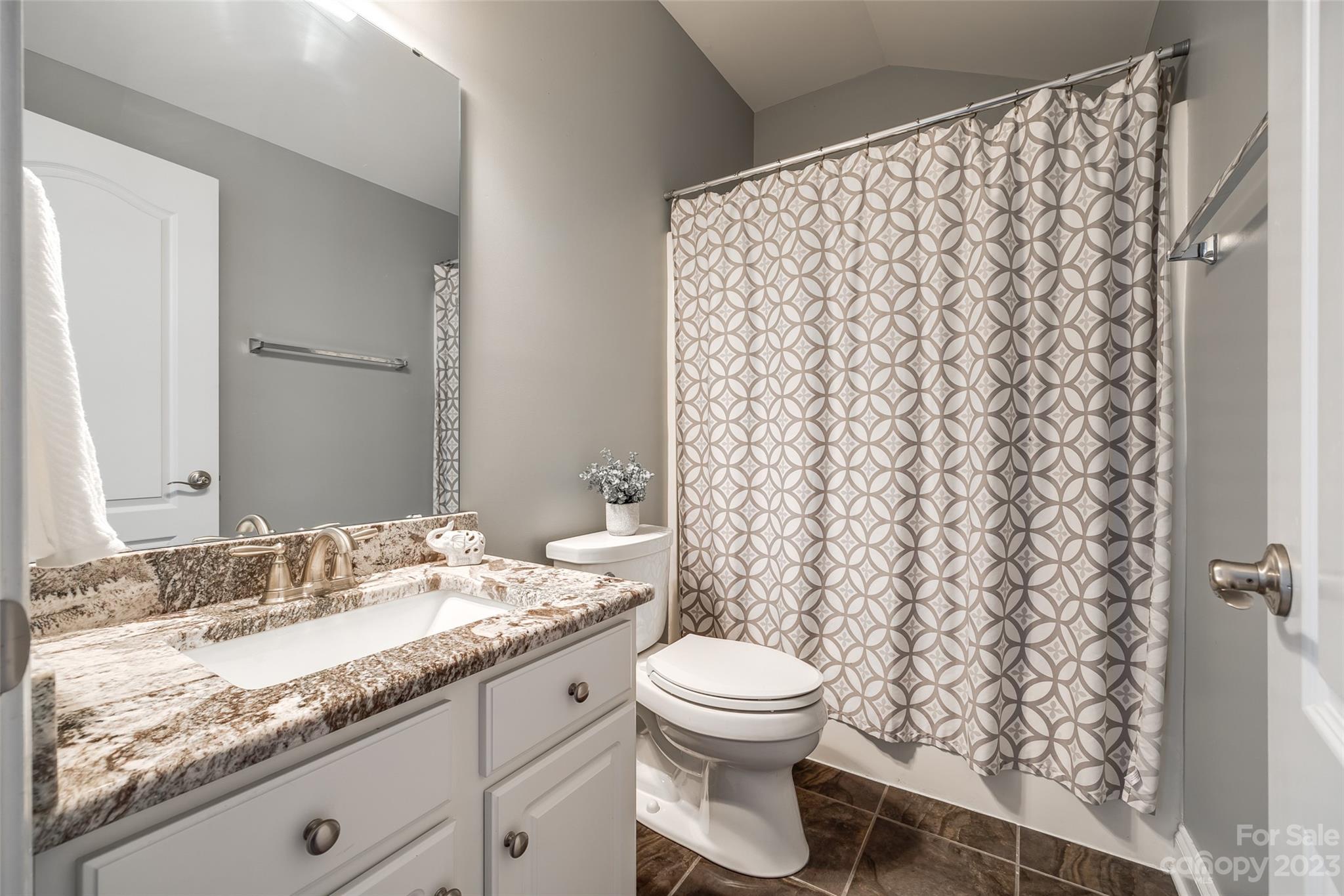 675 Quicksilver Trail Fort Mill, SC 29708 - Photo 34 of 48 a bathroom with a granite countertop sink toilet and shower