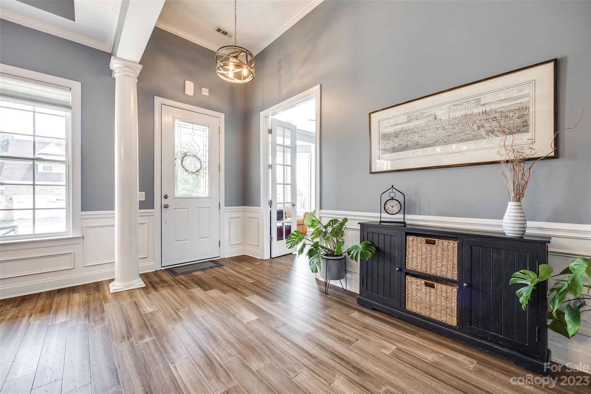 675 Quicksilver Trail Fort Mill, SC 29708 - Photo 4 of 48 workspace with wooden floor and a potted plant