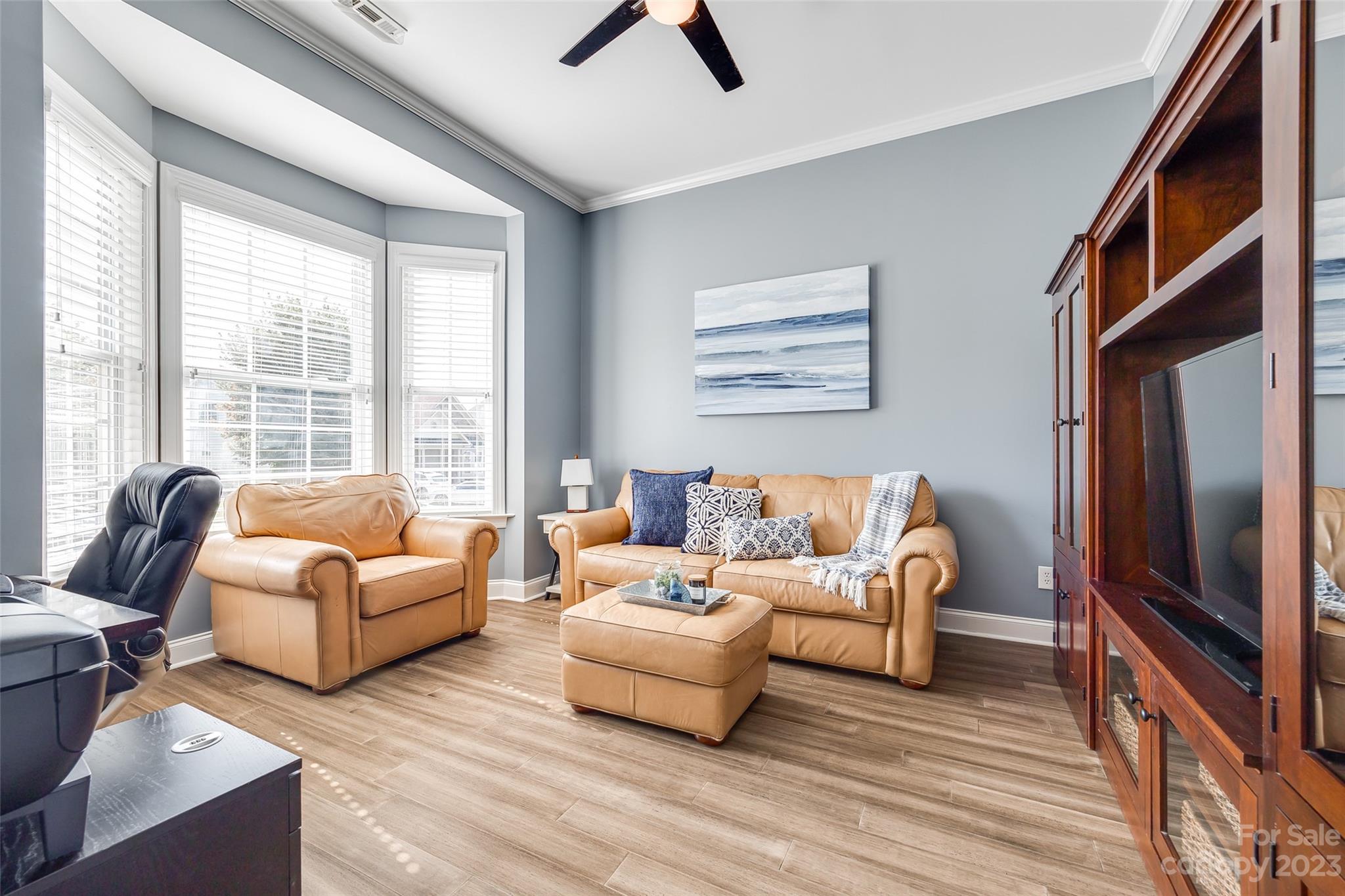 675 Quicksilver Trail Fort Mill, SC 29708 - Photo 6 of 48 a living room with furniture and a flat screen tv