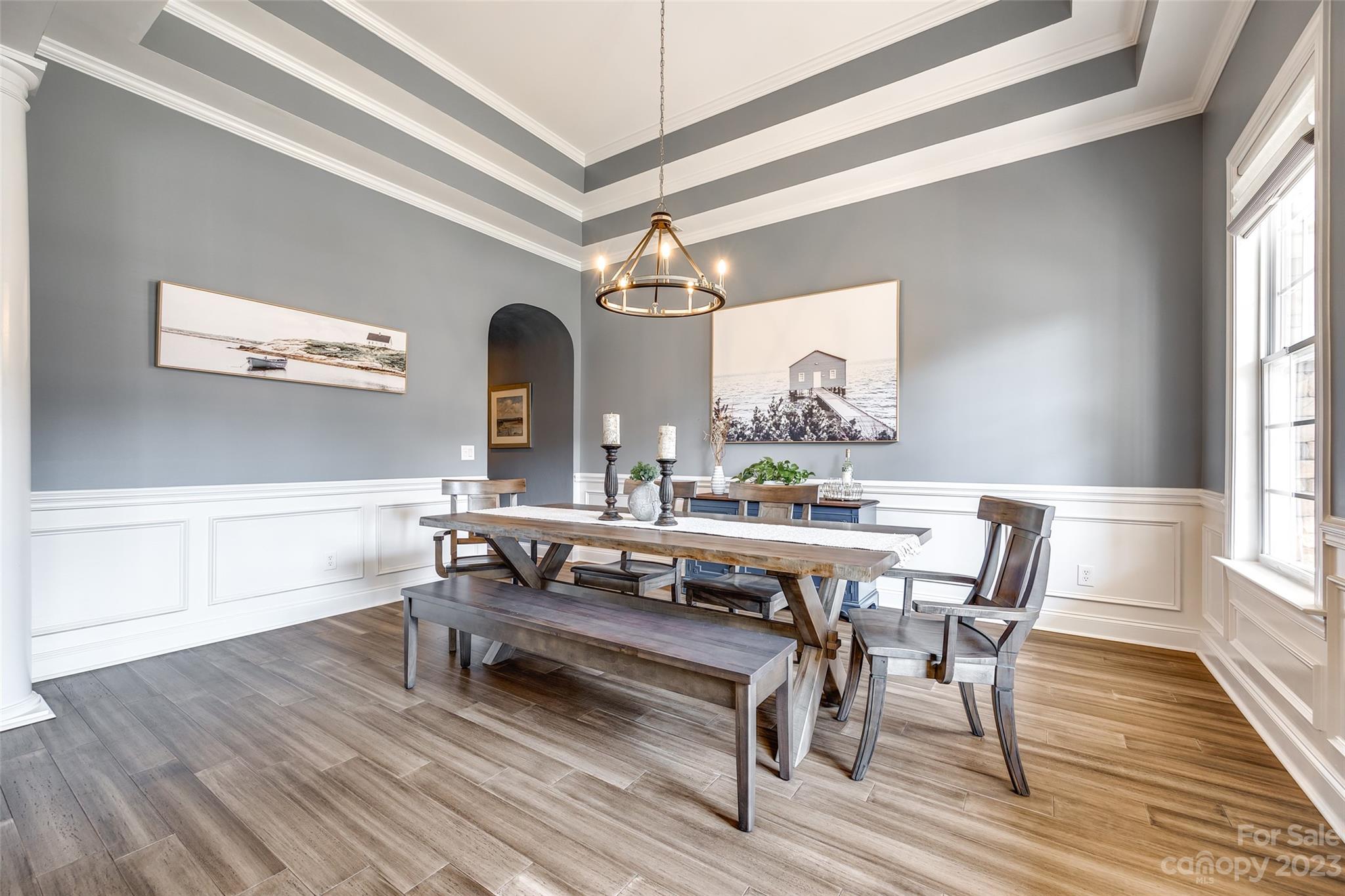 675 Quicksilver Trail Fort Mill, SC 29708 - Photo 8 of 48 a view of a dining room with furniture window and wooden floor