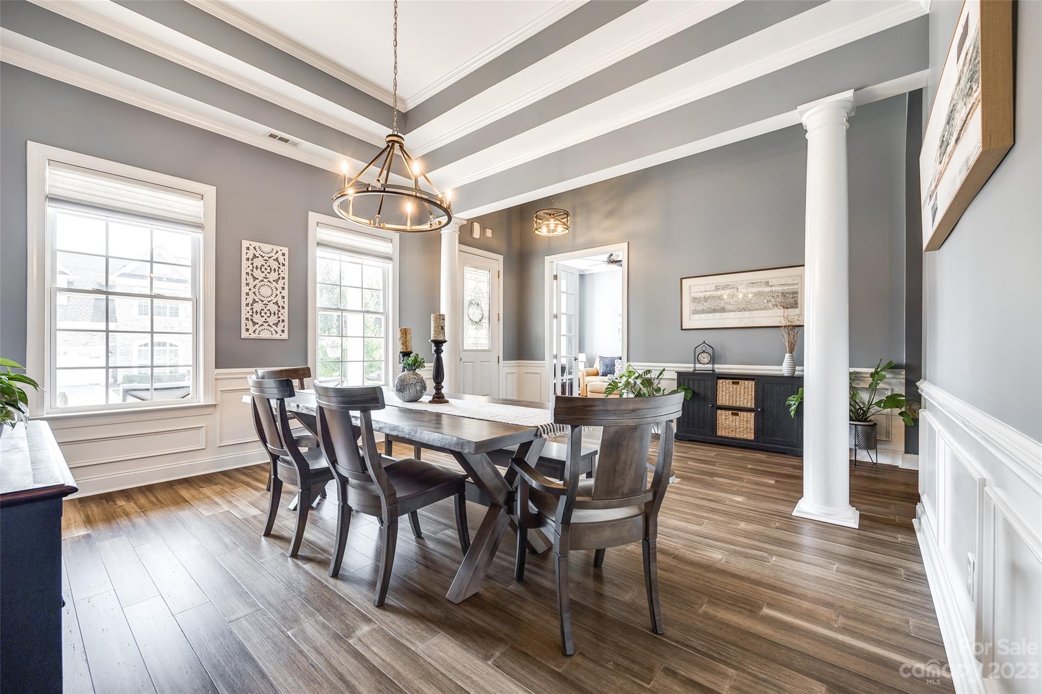 675 Quicksilver Trail Fort Mill, SC 29708 - Photo 9 of 48 a view of a a dining room with furniture window and wooden floor