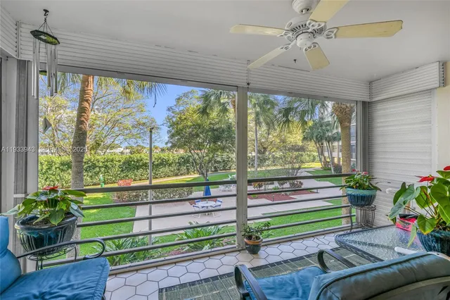 a view of a building with a yard