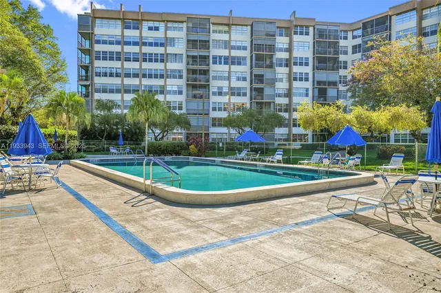 a view of a backyard with garden