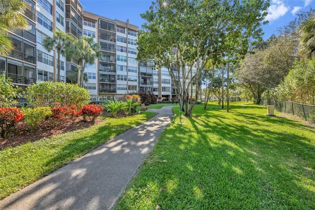 an aerial view of residential house with outdoor space and river