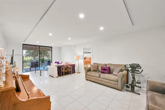 a kitchen with cabinets stainless steel appliances and a sink