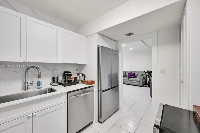 a bedroom with a bed and a table