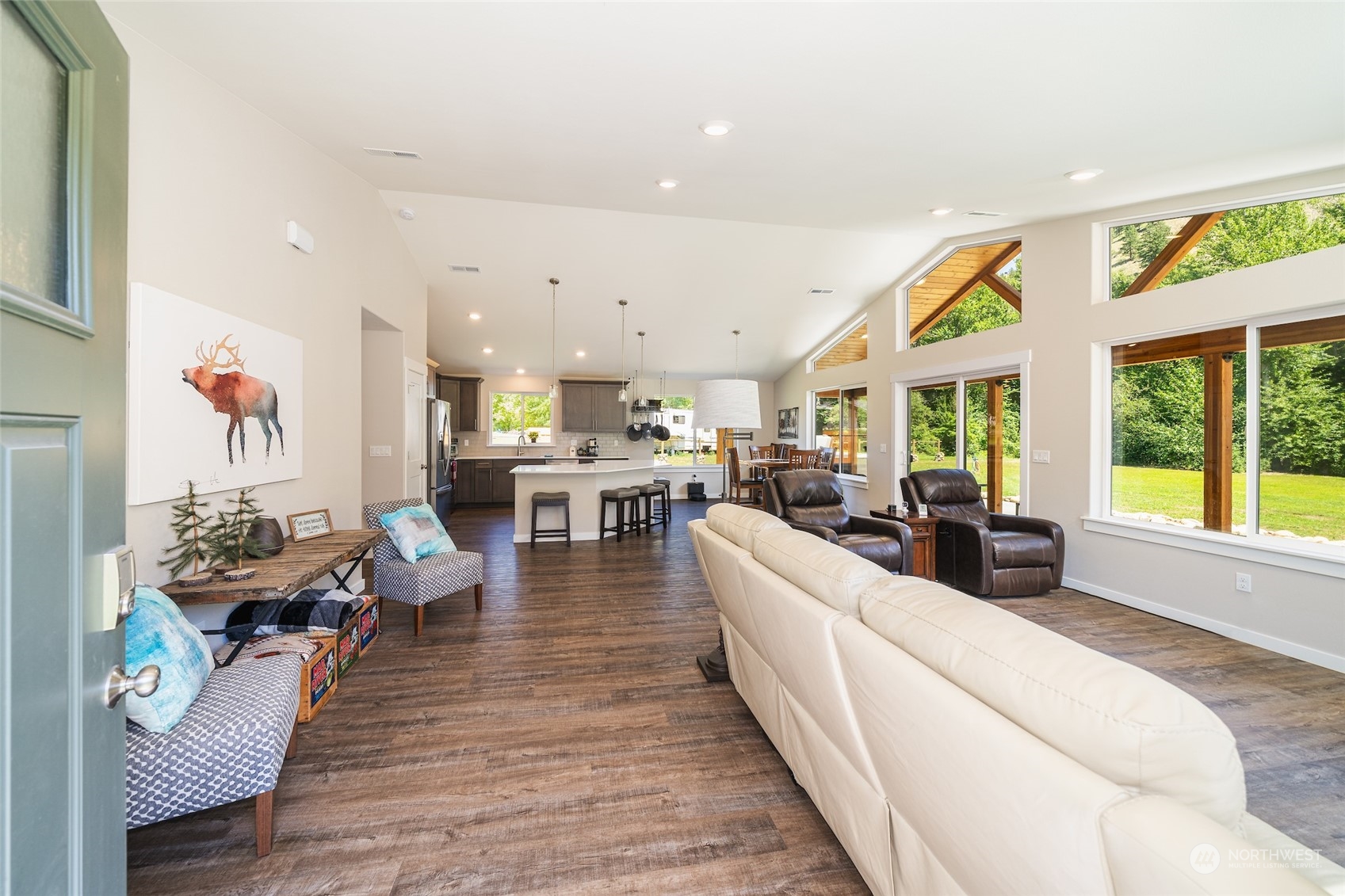 166 Mad River Road Entiat, WA 98822 - Photo 21 of 40 a living room with furniture and a large window