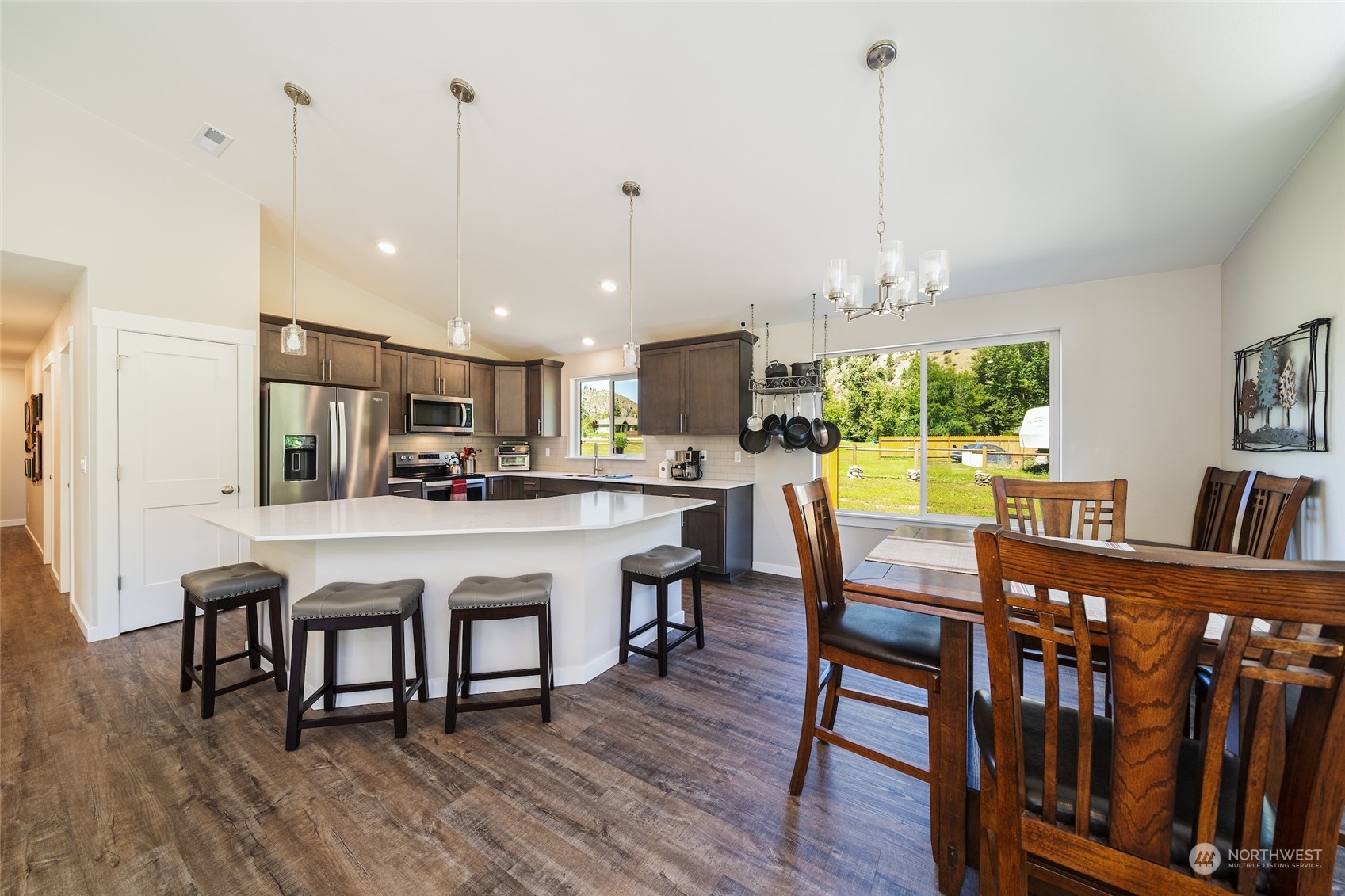 166 Mad River Road Entiat, WA 98822 - Photo 25 of 40 a living room with stainless steel appliances kitchen island granite countertop furniture and a kitchen view