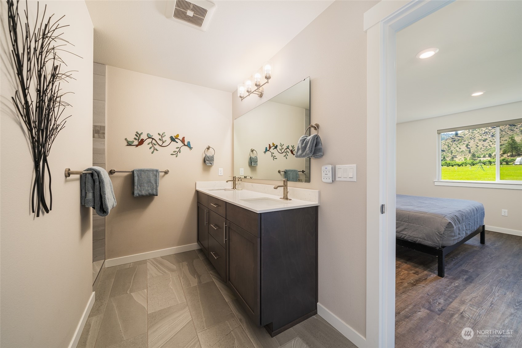 166 Mad River Road Entiat, WA 98822 - Photo 37 of 40 a bathroom with a sink vanity and a mirror