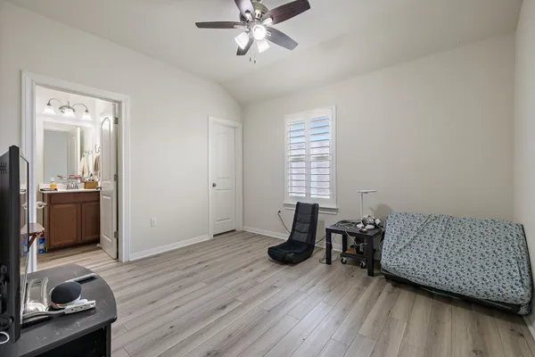 a view of a livingroom with furniture and windows
