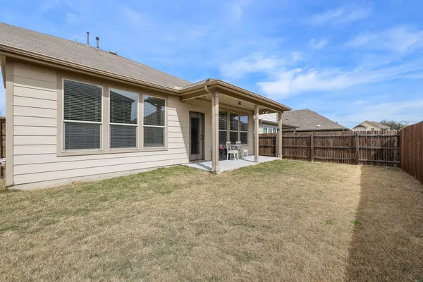 a house view with a garden space
