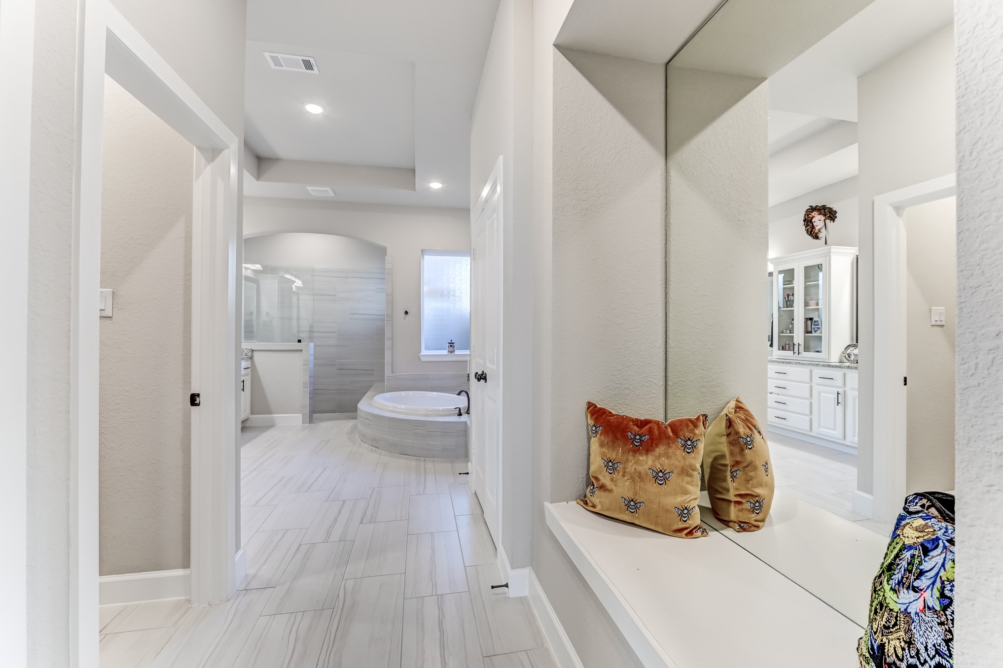 404 Summit Ridge Court Conroe, TX 77318 - Photo 39 of 50 a spacious bathroom with a double vanity sink and a mirror
