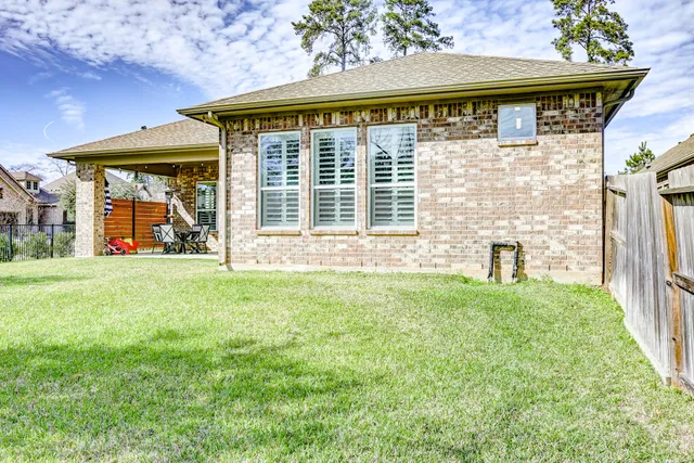 $450,000 | 404 Summit Ridge Court, Conroe, TX 77318