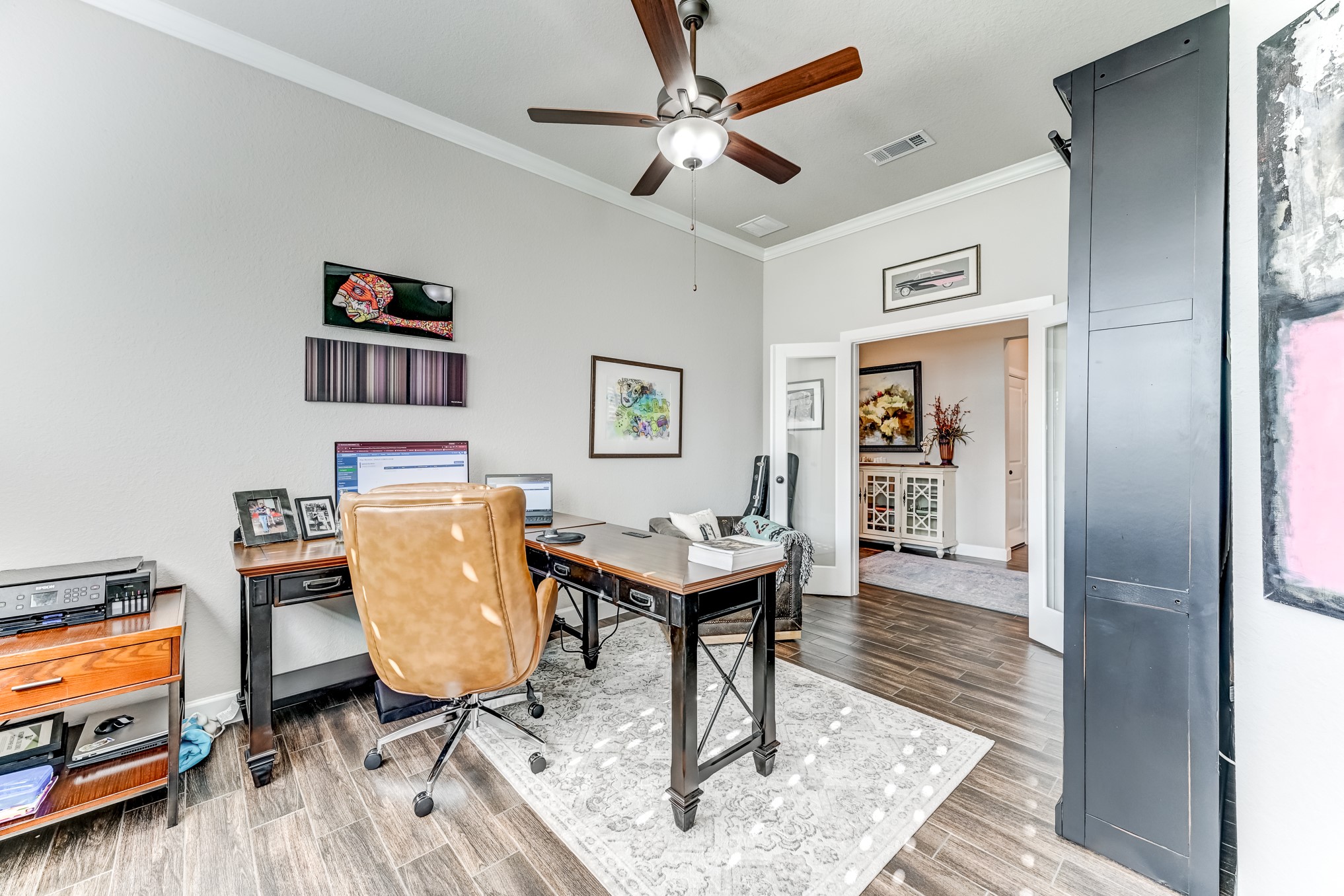 404 Summit Ridge Court Conroe, TX 77318 - Photo 8 of 50 a living room with furniture and a wooden floor