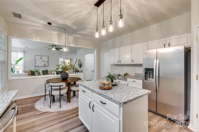 a view of a hallway with an empty room