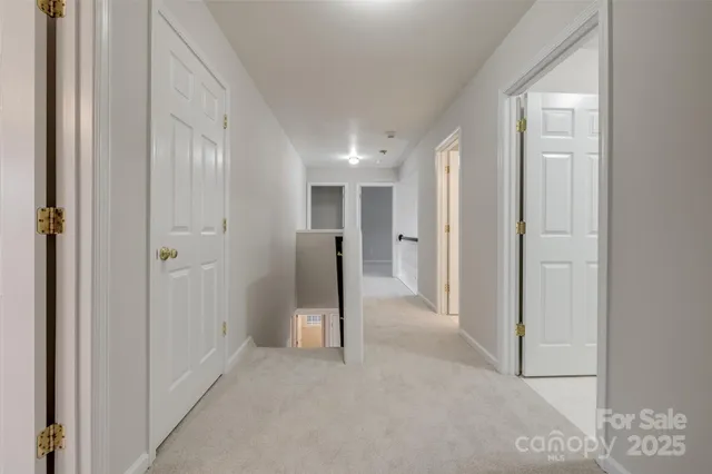 a spacious bathroom with a double vanity sink mirror and shower