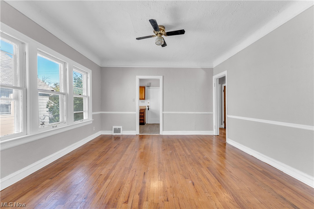 1499 Sherbrook Road South Euclid, OH 44121 - Photo 7 of 41 Hardwood floored spare room featuring ceiling fan