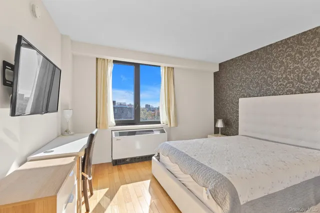 a bathroom with a double vanity sink toilet and shower