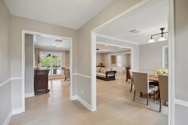 a view of a livingroom with furniture and a flat screen tv