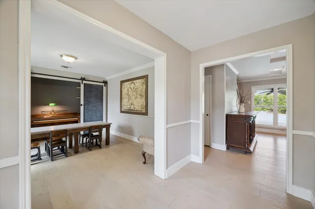 a view of a livingroom with furniture and windows