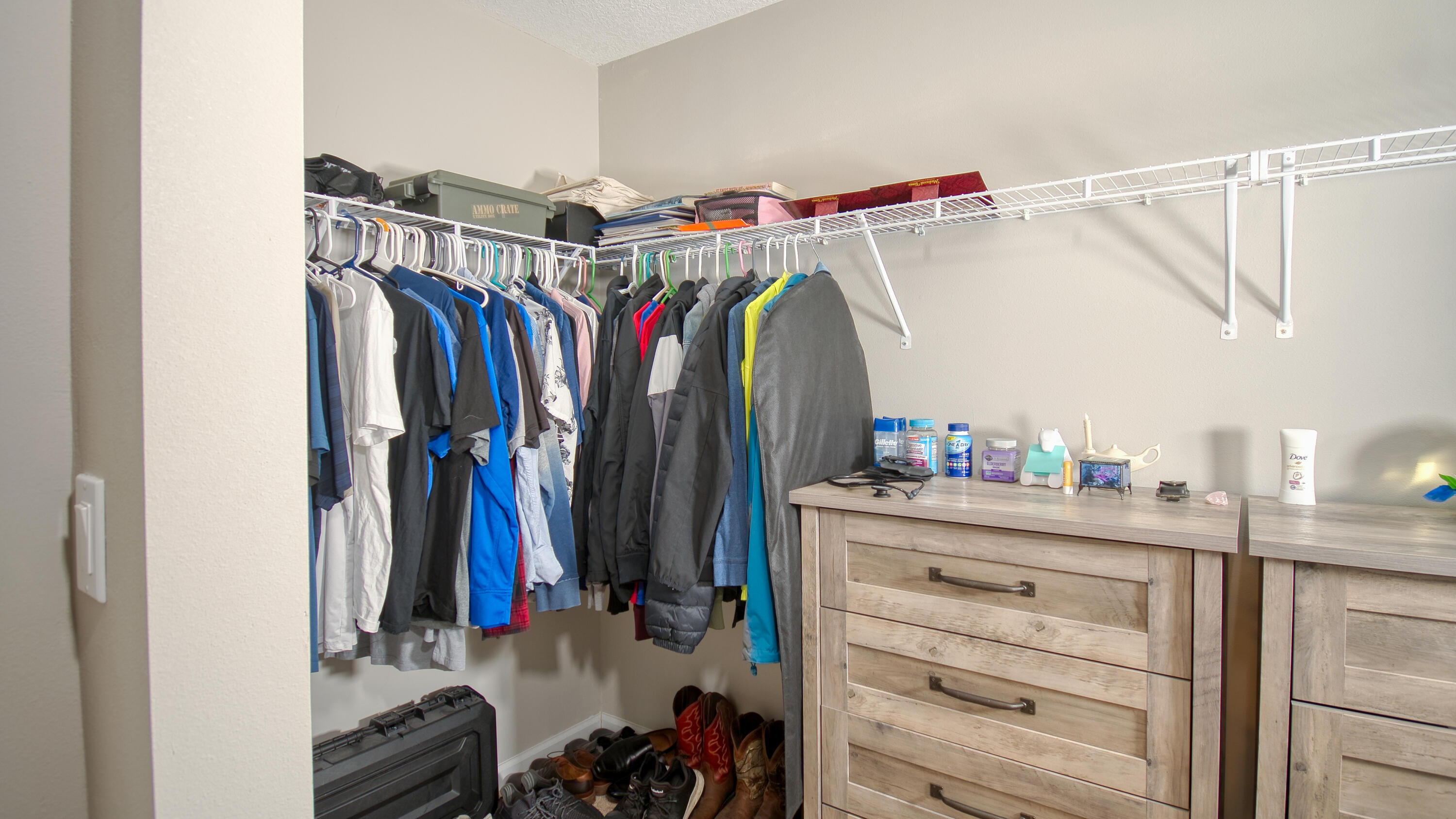1780 Southwest Leafy Road Port St. Lucie, FL 34953 - Photo 15 of 30 a view of walk in closet with clothes and shoes