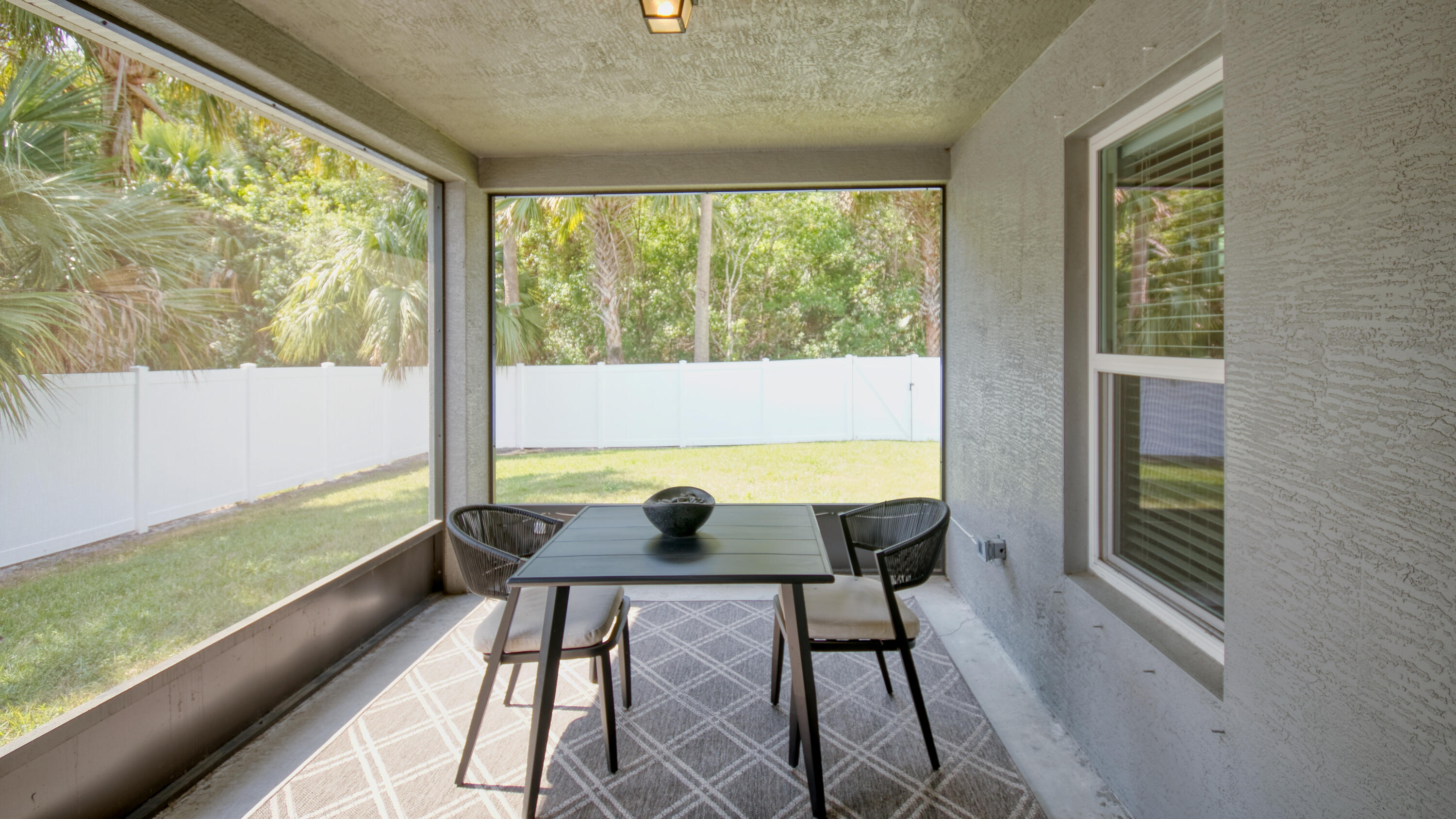 1780 Southwest Leafy Road Port St. Lucie, FL 34953 - Photo 26 of 30 a view of a room with a large window and furniture