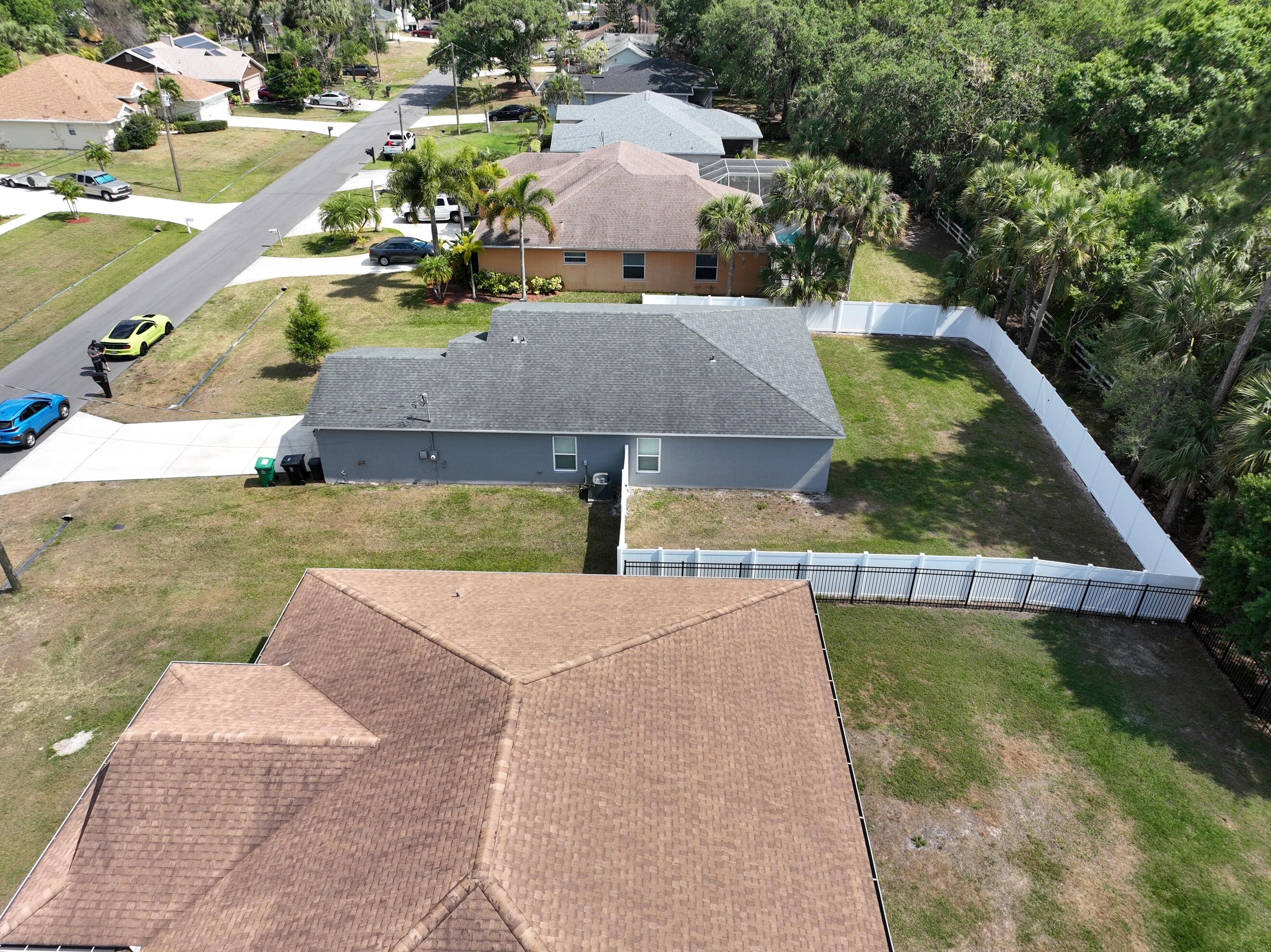 1780 Southwest Leafy Road Port St. Lucie, FL 34953 - Photo 29 of 30 a view of a house with pool