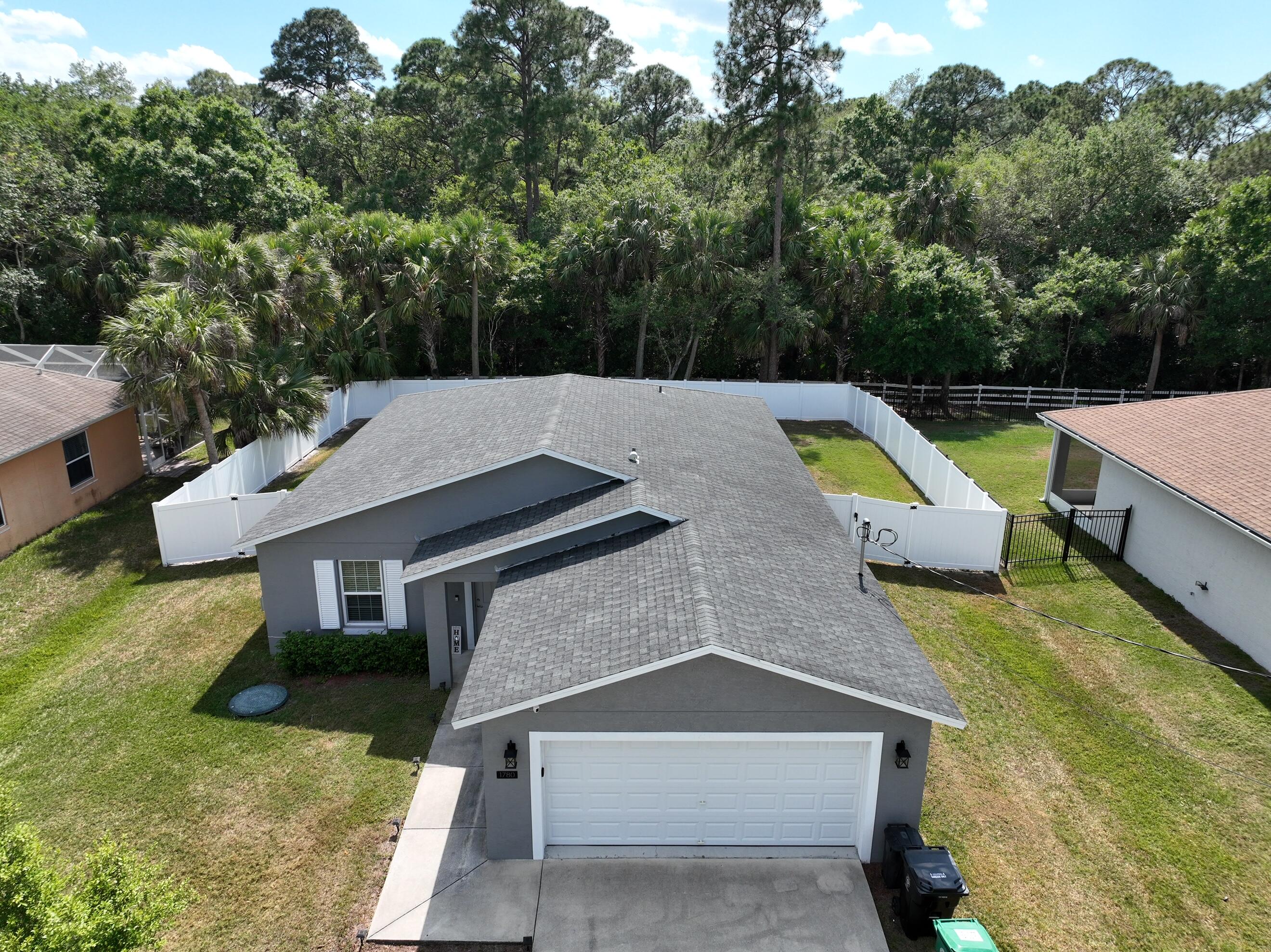 1780 Southwest Leafy Road Port St. Lucie, FL 34953 - Photo 4 of 30 an aerial view of a house with swimming pool