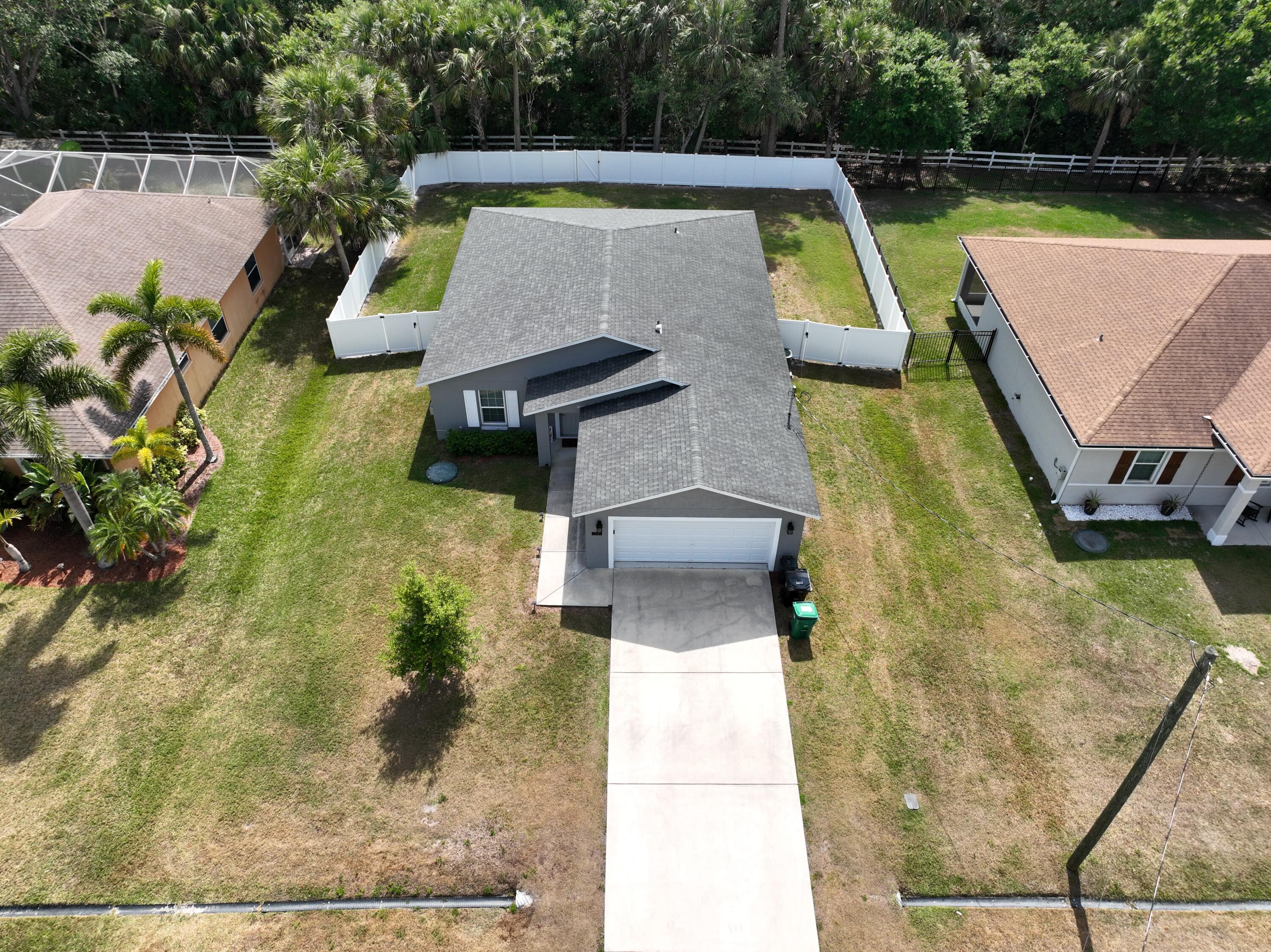 1780 Southwest Leafy Road Port St. Lucie, FL 34953 - Photo 5 of 30 a view of swimming pool with a patio