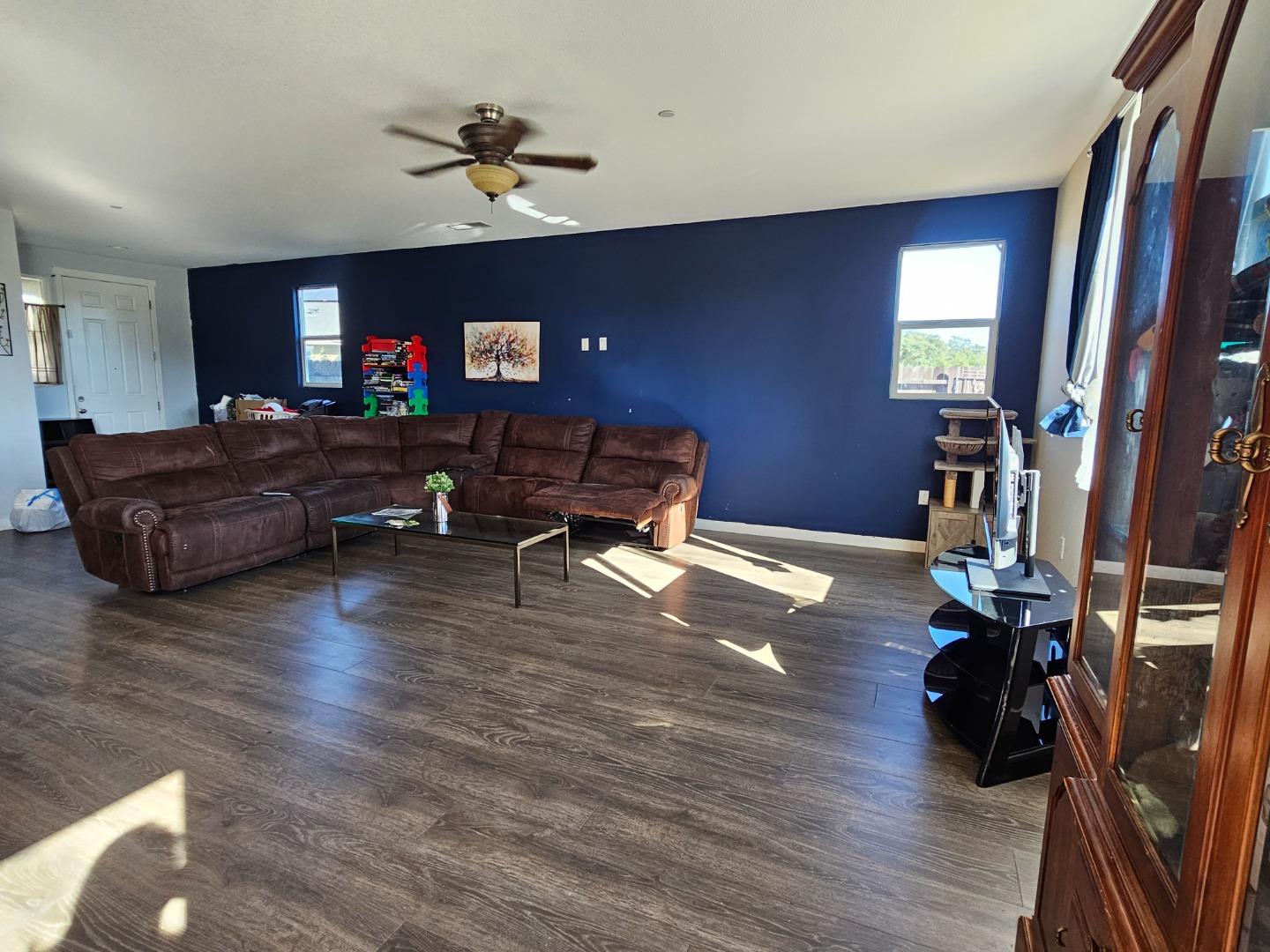 184 Raccoon Hollow Loop Copperopolis, CA 95228 - Photo 3 of 8 a living room with furniture and a wooden floor