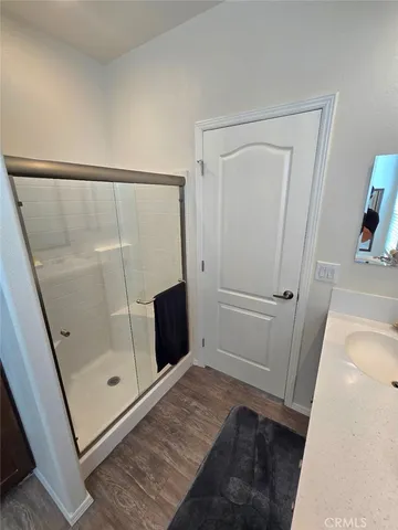 a view of a bathroom from the hallway