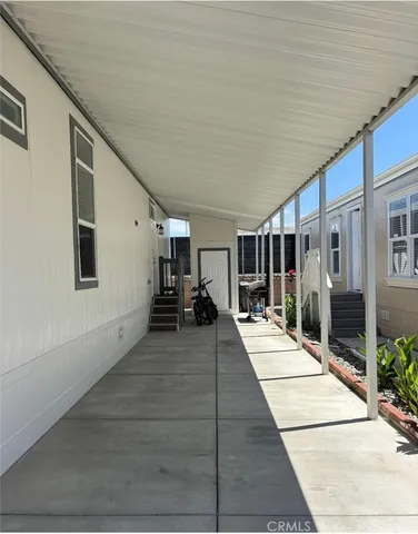 a view of swimming pool with seating space