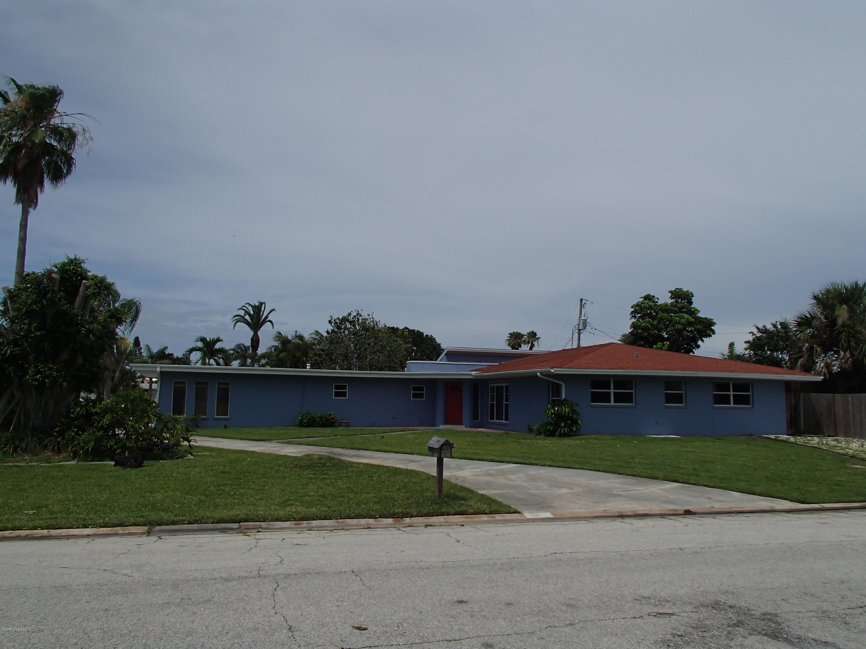 703 Bermuda Road Cocoa Beach, FL 32931 - Photo 1 of 19 an aerial view of a house