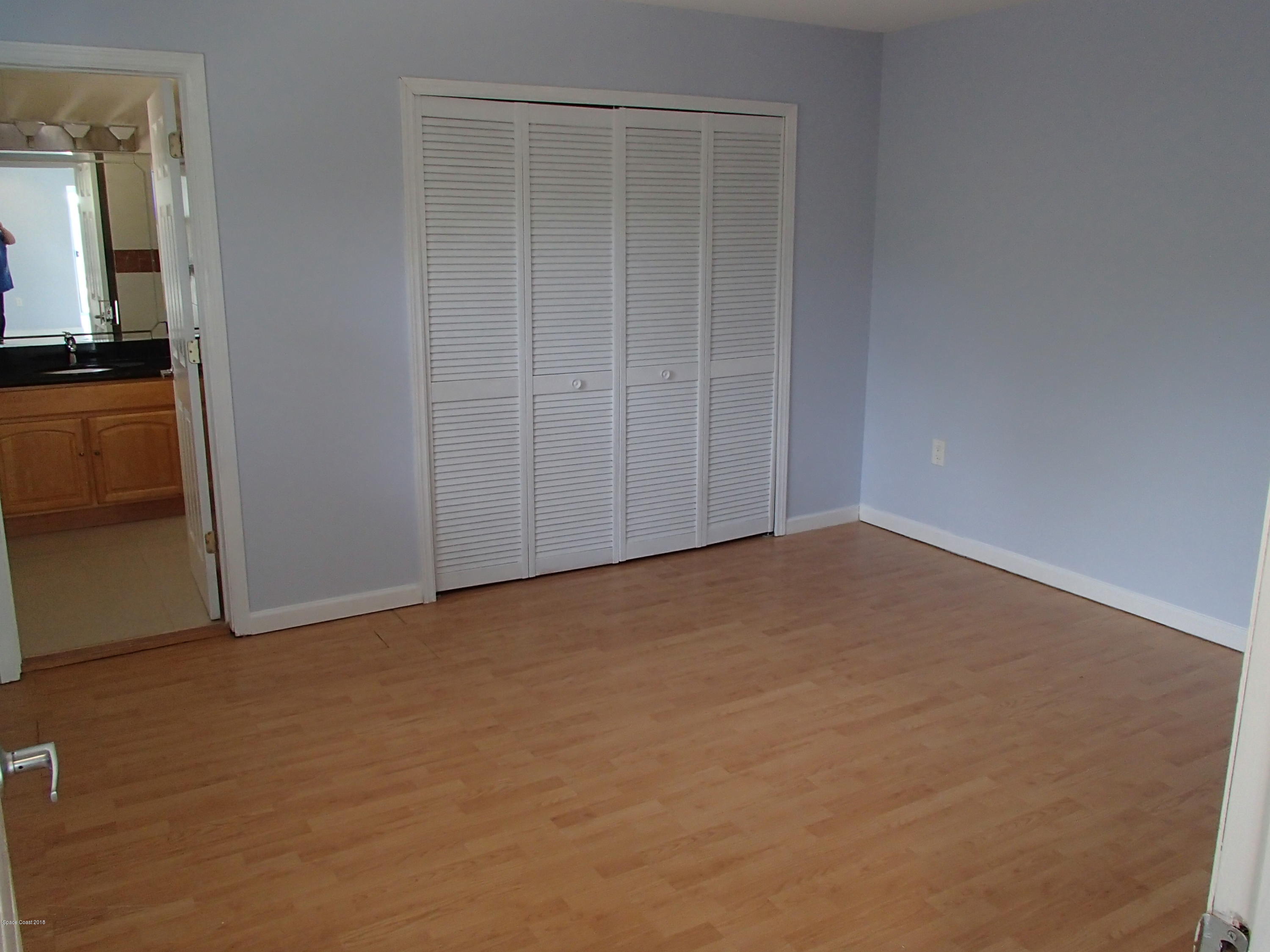 703 Bermuda Road Cocoa Beach, FL 32931 - Photo 9 of 19 a view of an empty room