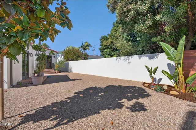 a view of a house with a street