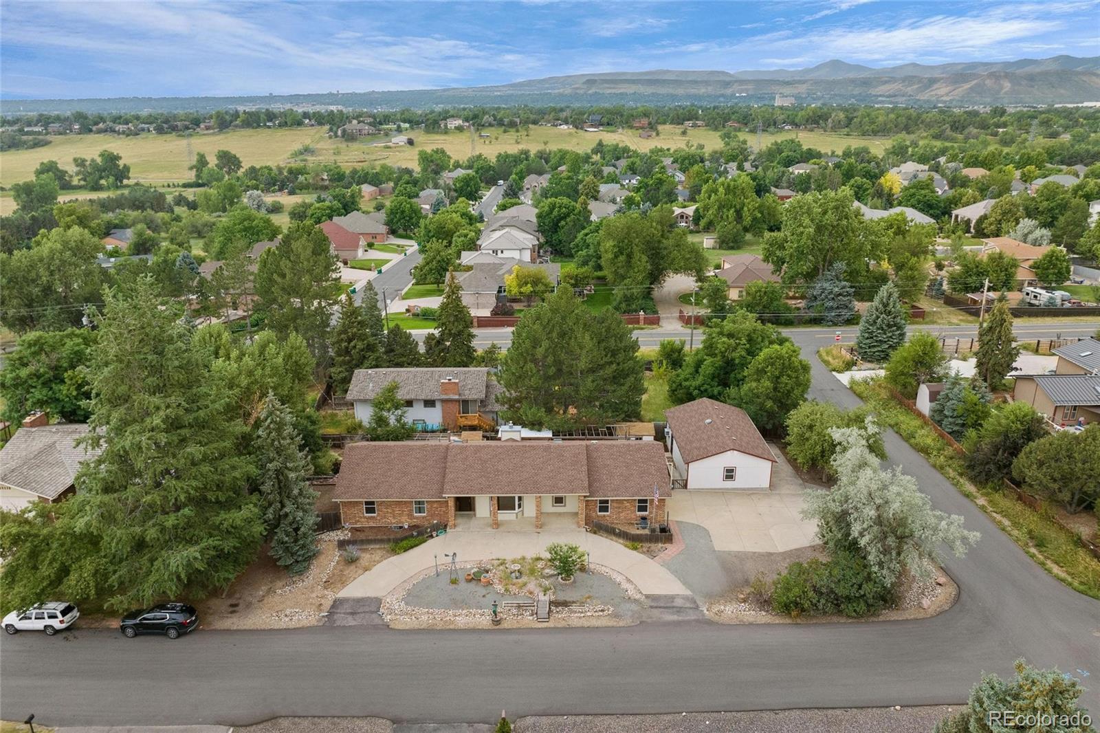 an aerial view of a house with a garden