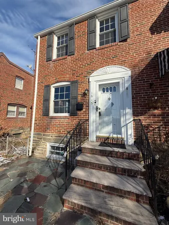a front view of a house with a window