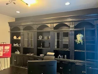 a kitchen with a refrigerator and a sink