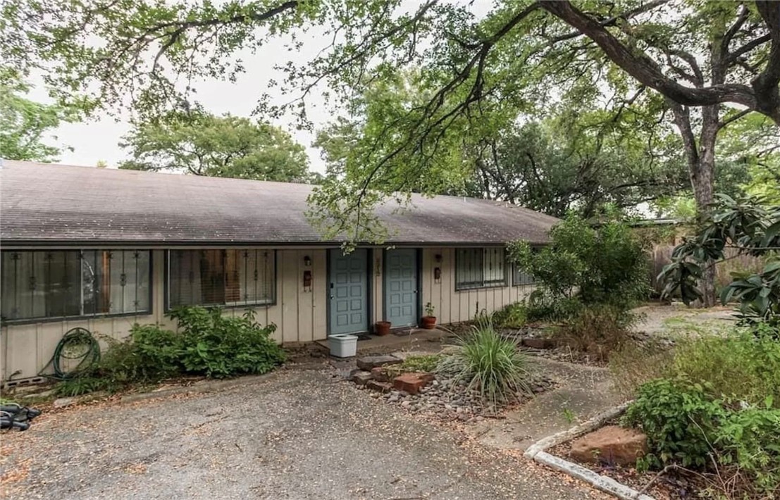 2212 Trailside Drive Austin, TX 78704 - Photo 1 of 1 a front view of a house with garden
