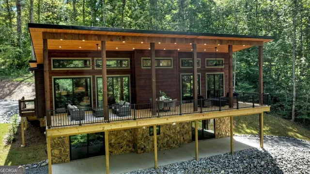 a view of an chairs and table in a patio