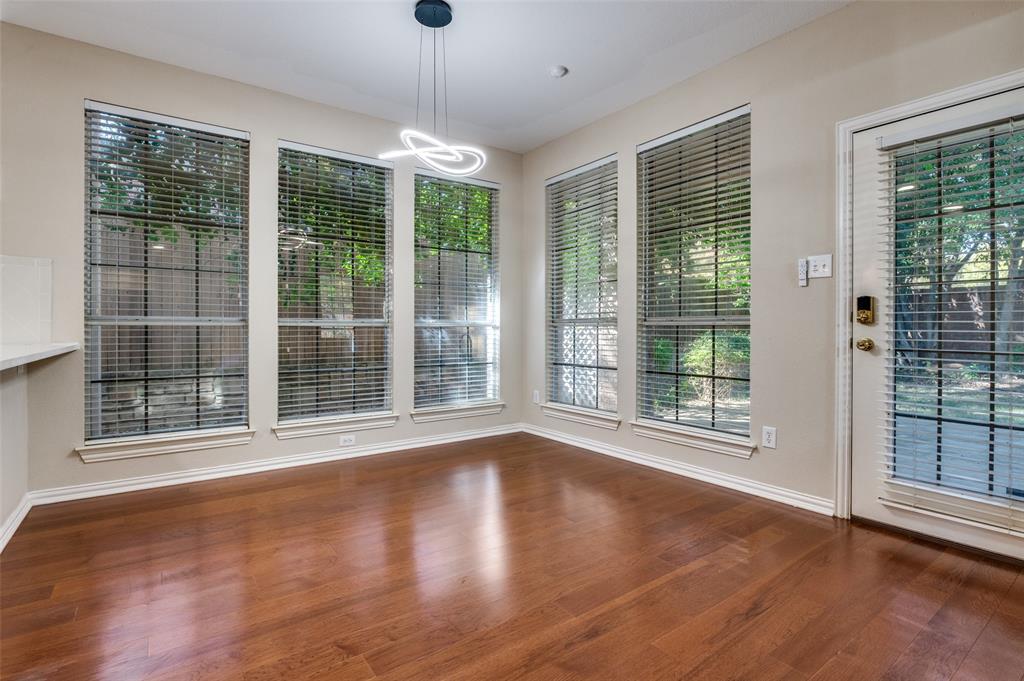 602 Signet Court Keller, TX 76248 - Photo 13 of 30 a view of an empty room with wooden floor and a window