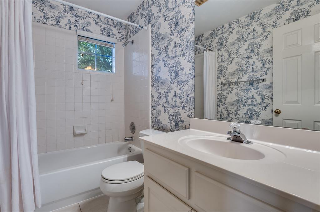 602 Signet Court Keller, TX 76248 - Photo 19 of 30 a bathroom with a sink toilet and shower
