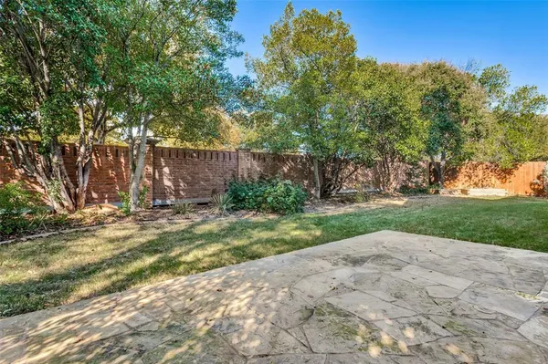 a view of backyard with green space