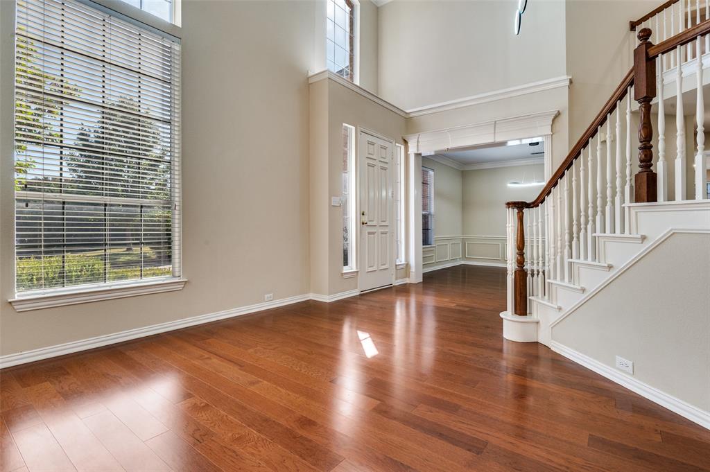 602 Signet Court Keller, TX 76248 - Photo 5 of 30 a view of empty room with wooden floor and fan