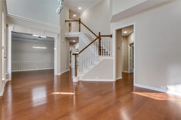 a view of entryway with wooden floor